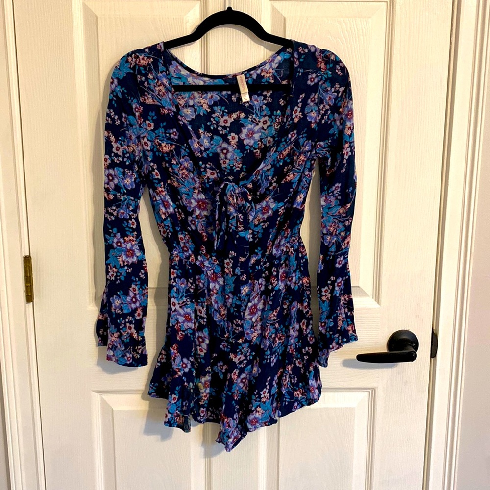 Exhilaration Size Small blue floral romper with long sleeves, ruffled hems
